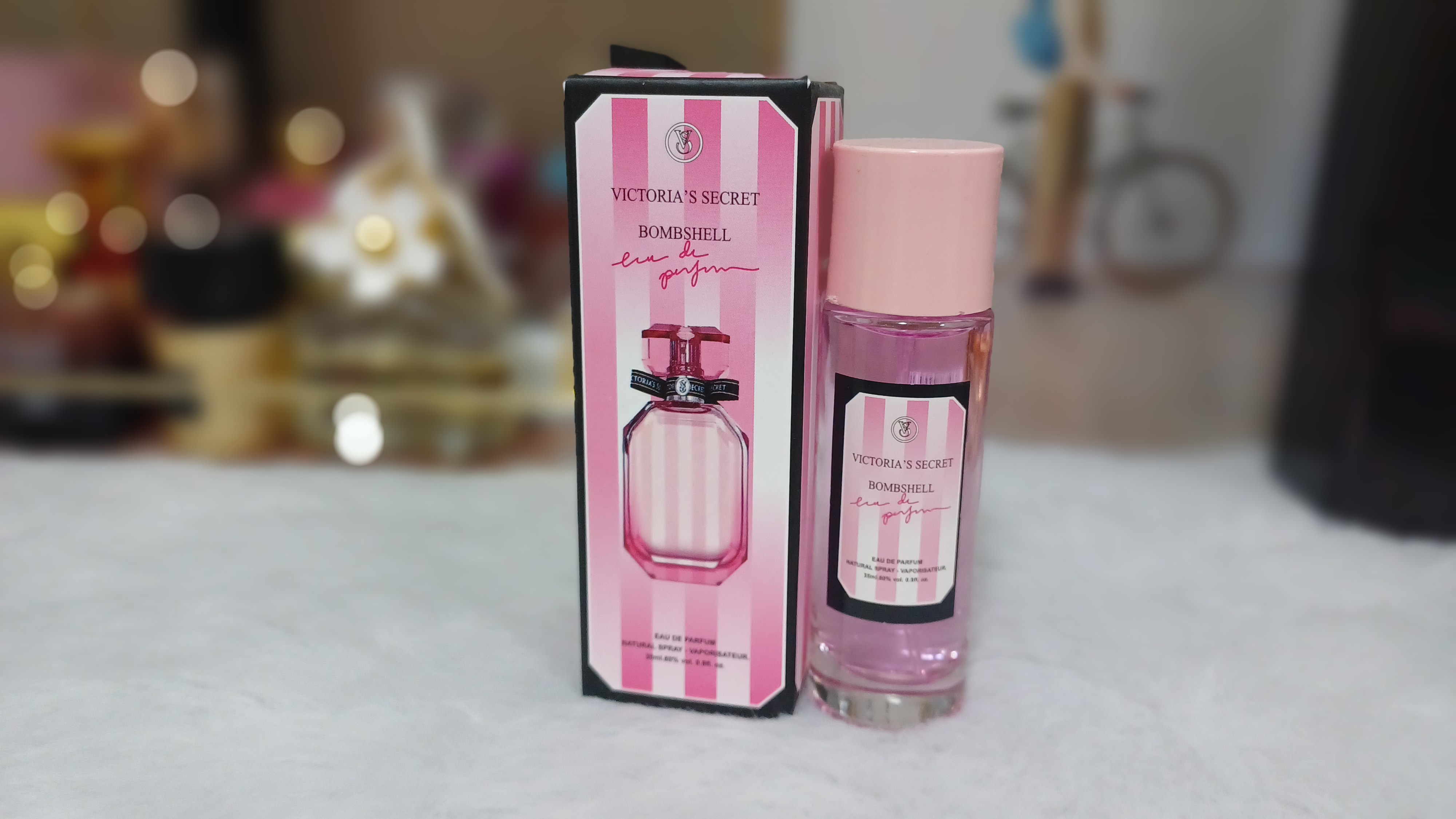 ادکلن ۳۵میل الحمبرا بامشل سکرتvictoria secret bomshell ارجینال